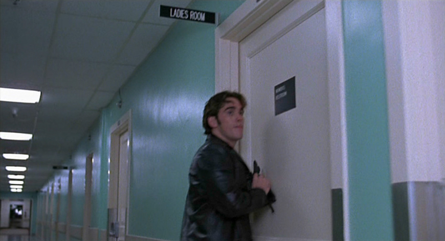 Bob hiding in women's restroom.